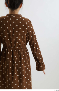 Aera  1 arm back view brown dots dress casual…